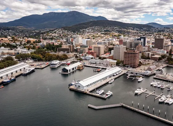 Aerial view of Hobart waterfront and CBD with kunanyi / Mount Wellington in the background, Tasmania