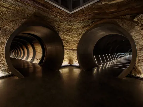 Circular tunnel entrances at Siloam underground gallery, Museum of Old and New Art (Mona), Berriedale, Tasmania