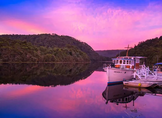 Arcadia II heritage cruise boat moored on the Pieman River at sunset, Corinna, takayna / Tarkine