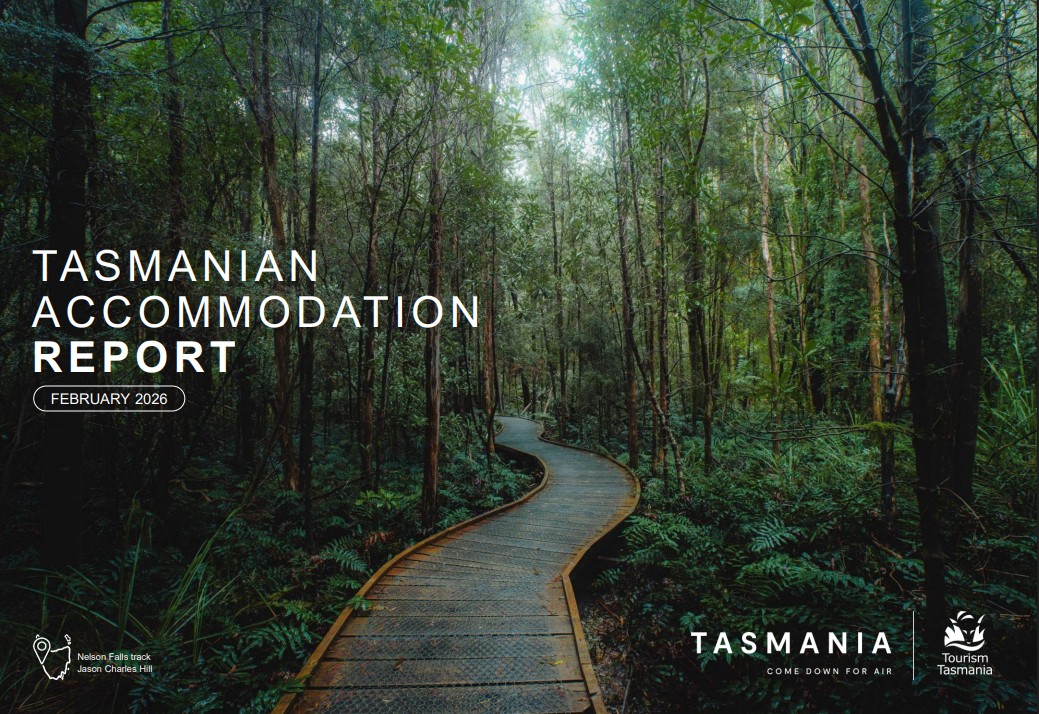 Cover of Tourism Tasmania's Accommodation Report February 2026, with a boardwalk through forest at Southwest Wilderness Camp