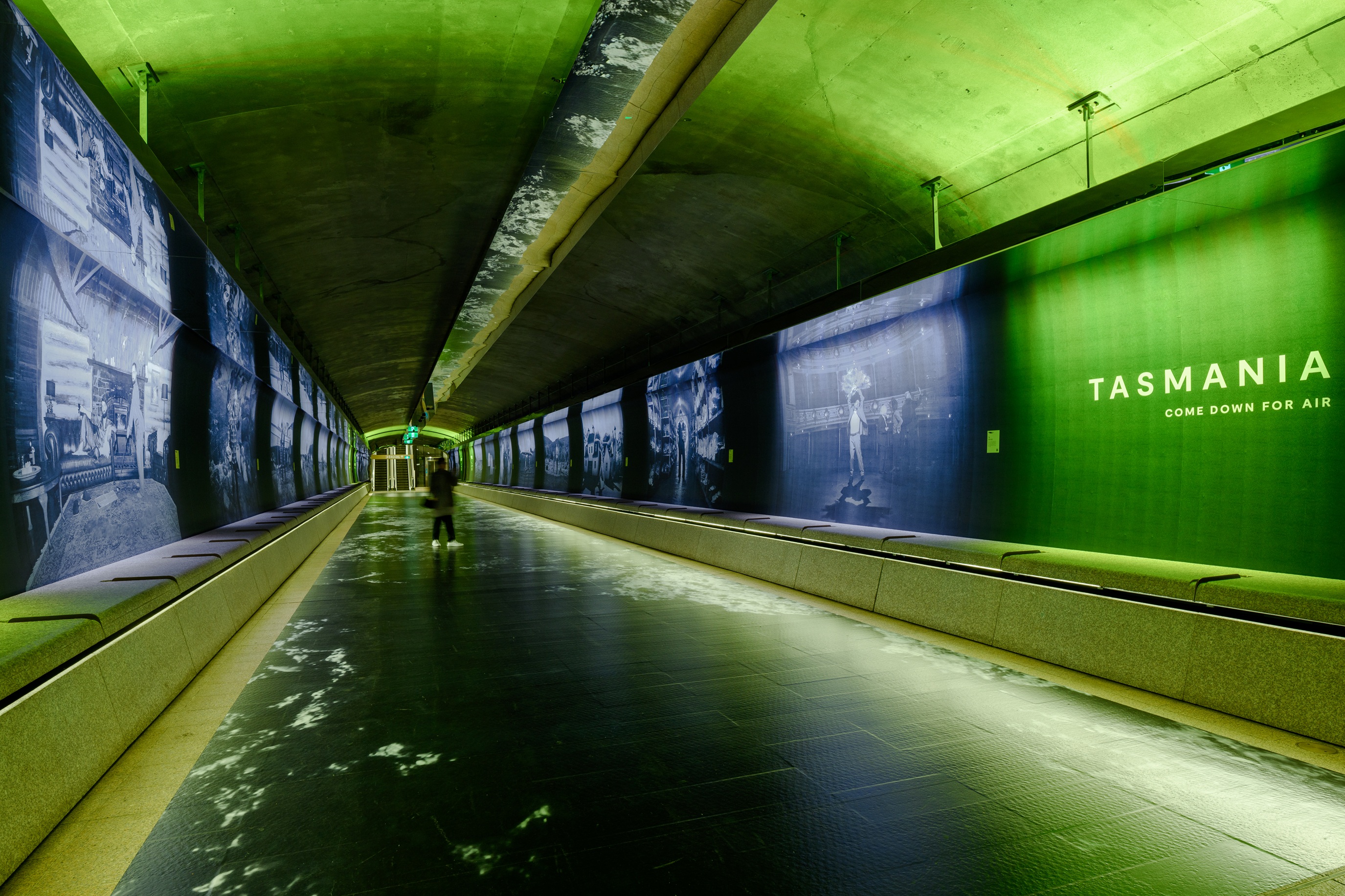 The Off Season Tasmania campaign installation filling the Martin Place Metro tunnel in Sydney with immersive light and imagery