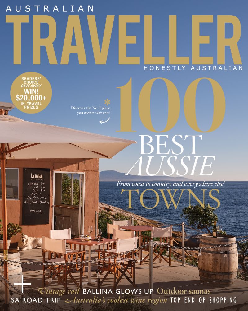 Australian Traveller magazine cover featuring Le Gulch wine bar in Bicheno with the headline 100 Best Aussie Towns