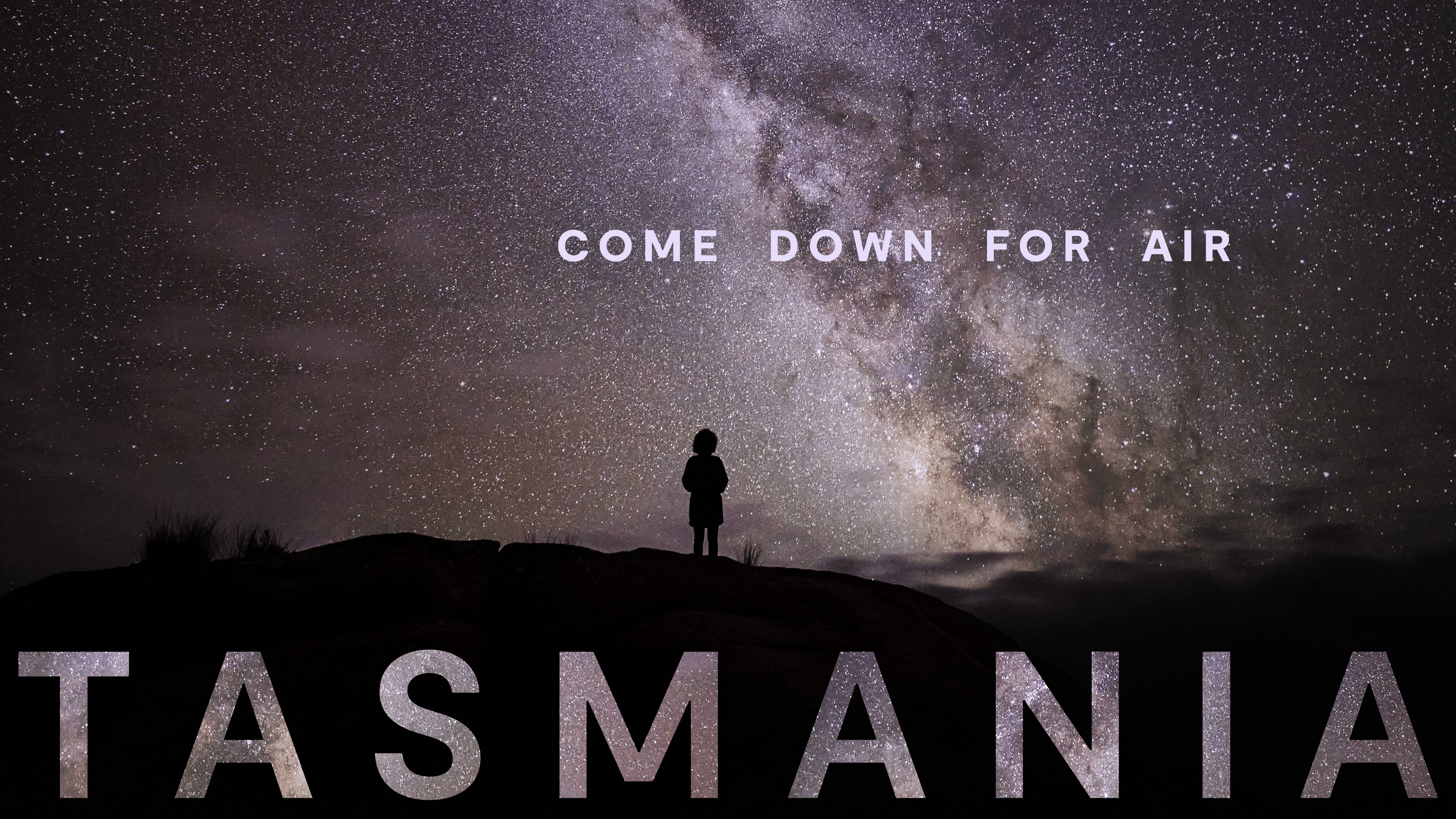 Tasmania Come Down For Air brand image showing a person silhouetted on a hilltop beneath the Milky Way in a night sky