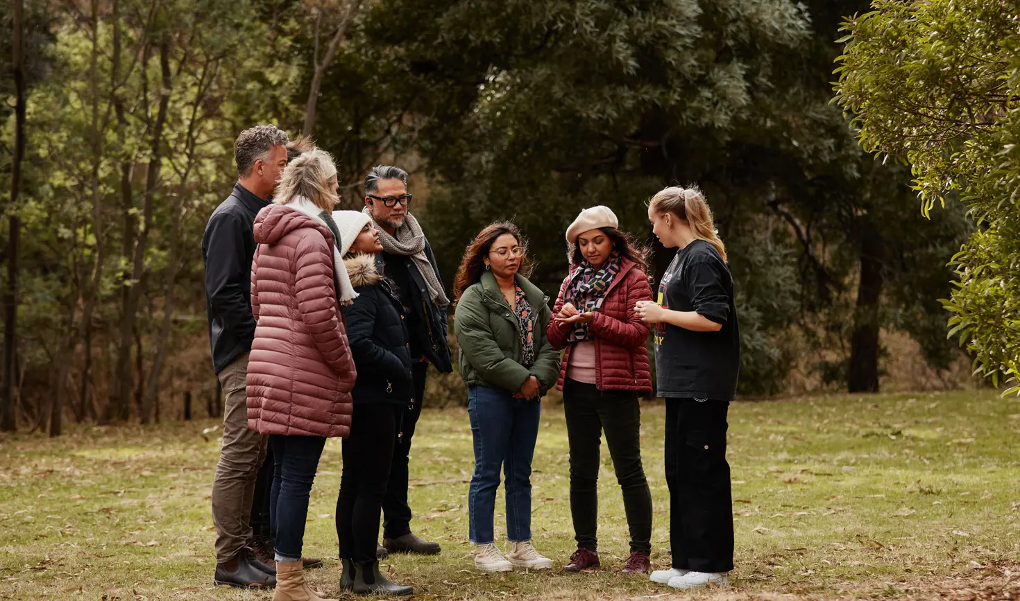 Visitors listen to a guide during a kipli takara tour with palawa kipli, Risdon Cove