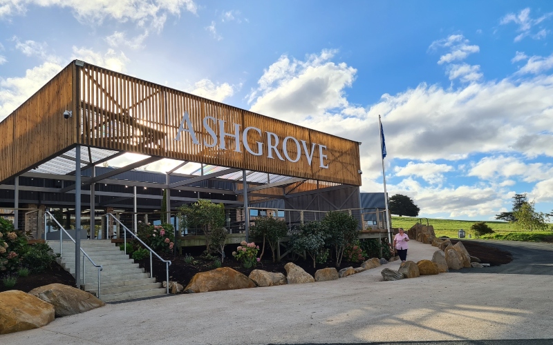 A photo of the front facade of The Ashgrove Diary Door visitor centre.