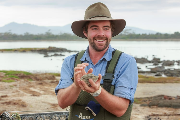 a farmer with an oyster