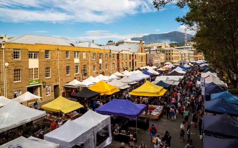 A photograph of bustling Salamanca Market in Hobart, Tasmania on a sunny day