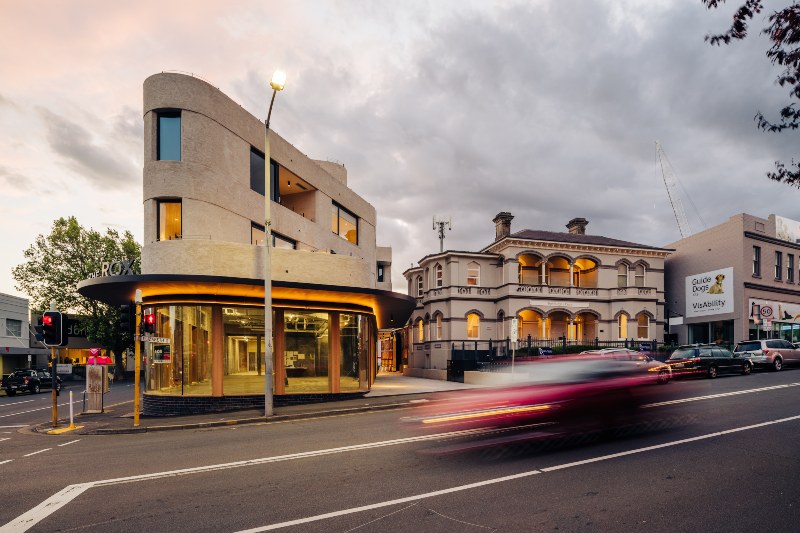 The curved cornice of the newly built Rox looks over Elizabeth Street.